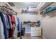 Spacious walk-in closet with ample shelving and clothing racks for storage at 1031 Ridge View Ln, Palm Harbor, FL 34683