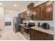 Modern kitchen with granite countertops, stainless steel appliances, and plenty of cabinet space at 11086 Sundrift Dr, Tampa, FL 33647