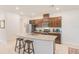 Well-equipped kitchen with island seating, stainless appliances, and a functional layout at 11086 Sundrift Dr, Tampa, FL 33647