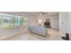 Bright living room with large windows overlooking the backyard at 11086 Sundrift Dr, Tampa, FL 33647