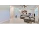 Open living space with kitchen, dining area, and spacious living room with comfortable sofa at 11086 Sundrift Dr, Tampa, FL 33647