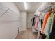 Spacious walk-in closet with ample shelving and hanging space to maximize storage at 11086 Sundrift Dr, Tampa, FL 33647