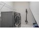 Laundry room with washer, dryer, and shelving at 13325 Sunset Shore Cir, Riverview, FL 33579
