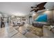 Open concept living area with elegant dining and comfortable seating, perfect for entertaining at 13325 Sunset Shore Cir, Riverview, FL 33579