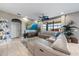 Comfortable living room featuring a large sectional couch, entertainment center, and cozy decor at 13325 Sunset Shore Cir, Riverview, FL 33579
