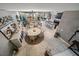 Open concept living space with dining area, kitchen, and chandelier at 13325 Sunset Shore Cir, Riverview, FL 33579