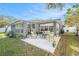 An outdoor patio with seating area in the backyard provides a relaxing space for enjoying the outdoors at 1424 Orange St, Clearwater, FL 33756