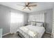 Bright bedroom with a ceiling fan, natural light, and a comfortable bed at 1424 Orange St, Clearwater, FL 33756