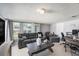 Living room with tile flooring, neutral decor, and a bright atmosphere at 1424 Orange St, Clearwater, FL 33756