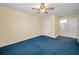 Bedroom with closet and bathroom access at 1438 Millstream Ln # 201, Dunedin, FL 34698