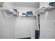 Walk-in closet featuring ample shelving, providing plenty of storage space at 1438 Millstream Ln # 201, Dunedin, FL 34698