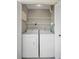 Laundry area with washer and dryer at 1438 Millstream Ln # 201, Dunedin, FL 34698