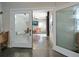 Bonus room access, featuring etched glass doors, decorative paint, and access to the recreation area at 16109 3Rd E St, Redington Beach, FL 33708