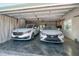 Wide two-car garage, epoxy floors, and ample lighting; stylishly stores two automobiles at 16109 3Rd E St, Redington Beach, FL 33708