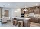 Modern kitchen with stainless steel appliances and a central island at 1672 Valier Pt, Zephyrhills, FL 33541