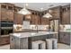 Modern kitchen with stainless steel appliances and a central island at 1672 Valier Pt, Zephyrhills, FL 33541