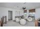 Upstairs loft with stylish seating, modern decor, and great natural light at 1672 Valier Pt, Zephyrhills, FL 33541