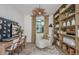 Home office with custom built-in shelving and a serene workspace at 1672 Valier Pt, Zephyrhills, FL 33541
