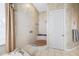 Luxurious bathroom with a walk-in shower and custom tiled surround at 19005 Cour Ests, Lutz, FL 33558