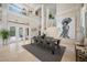 Bright dining area with skylights and French doors leading to an outdoor patio at 19005 Cour Ests, Lutz, FL 33558