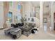 Inviting living room featuring plush seating and elegant decor at 19005 Cour Ests, Lutz, FL 33558