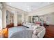 Elegant living room with spacious seating, recessed lighting, and access to the bedroom hallway at 19005 Cour Ests, Lutz, FL 33558