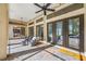 Spacious patio with comfortable seating, multiple entrances, and great natural light at 19005 Cour Ests, Lutz, FL 33558