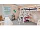 Bright bedroom features a bunk bed, a desk, and cozy carpet flooring at 1901 66Th N Ave, St Petersburg, FL 33702