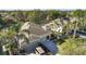 Attractive single-story home with a two-car garage and well-manicured landscaping at 1922 Sifield Greens Way # 47, Sun City Center, FL 33573