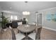 Inviting dining area perfect for entertaining and gatherings with cozy seating at 200 Glennes Ln # 201, Dunedin, FL 34698