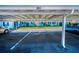 Assigned covered parking space at the complex at 200 Glennes Ln # 201, Dunedin, FL 34698