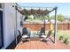 Inviting backyard patio with pergola and outdoor seating, perfect for entertaining or relaxation at 205 N Westland Ave, Tampa, FL 33606