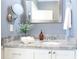 Stylish bathroom with granite vanity, framed mirror, and ample counter space at 205 N Westland Ave, Tampa, FL 33606