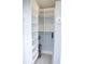 Walk-in closet features built-in shelving, providing ample storage space at 205 N Westland Ave, Tampa, FL 33606