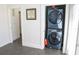 Cozy laundry room with full-size stacked washer and dryer at 205 N Westland Ave, Tampa, FL 33606