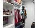 Well-organized closet with ample shelving and hanging space for clothing and accessories at 21298 Austin Ave, Port Charlotte, FL 33952