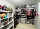 Spacious walk-in closet featuring ample shelving and hanging storage, perfect for organization at 21298 Austin Ave, Port Charlotte, FL 33952