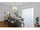 Bright dining room with modern chandelier and decorative buffet at 2904 N Shoreview Pl, Tampa, FL 33602