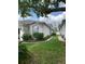 Charming single-story home featuring a two-car garage and well-maintained landscaping at 30049 Emmetts Ct, Wesley Chapel, FL 33543