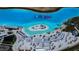 Aerial view of a large community pool area featuring beach access, and an aqua park at 31452 Cabana Rye Ave, San Antonio, FL 33576
