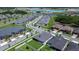 Aerial view of community featuring the home's backyard, manicured lawn, and neighboring residences at 31452 Cabana Rye Ave, San Antonio, FL 33576