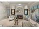 Cozy living room with fireplace, stylish decor, and comfortable seating arrangement at 34201 Kentucky Derby Pl, Dade City, FL 33525