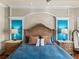 This is a detailed view of the main bedroom's luxurious decor and bedside tables at 34201 Kentucky Derby Pl, Dade City, FL 33525