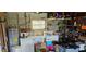 This is a partial view of a garage with laundry appliances. There is also misc storage in view at 5261 43Rd N Ave, St Petersburg, FL 33709