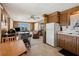 Inviting view of an open floorplan with kitchen, dining area and living room that is filled with natural light at 5306 Mary St, Zephyrhills, FL 33542