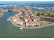 Beautiful aerial view of a waterfront condo with a private dock and access to the bay at 553 Haven Point Dr, Treasure Island, FL 33706