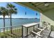 Charming balcony with seating and picturesque waterfront views, perfect for relaxation and enjoying the scenery at 553 Haven Point Dr, Treasure Island, FL 33706