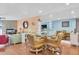 An open living room and dining room with plenty of seating and natural light at 553 Haven Point Dr, Treasure Island, FL 33706
