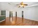 Spacious living room with hardwood floors and stylish chandelier at 5745 Pawnee St, Zephyrhills, FL 33542