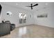 Large flex space has tile floors, large windows, a ceiling fan, and recessed lighting at 6113 Pasadena Point Blvd, Gulfport, FL 33707